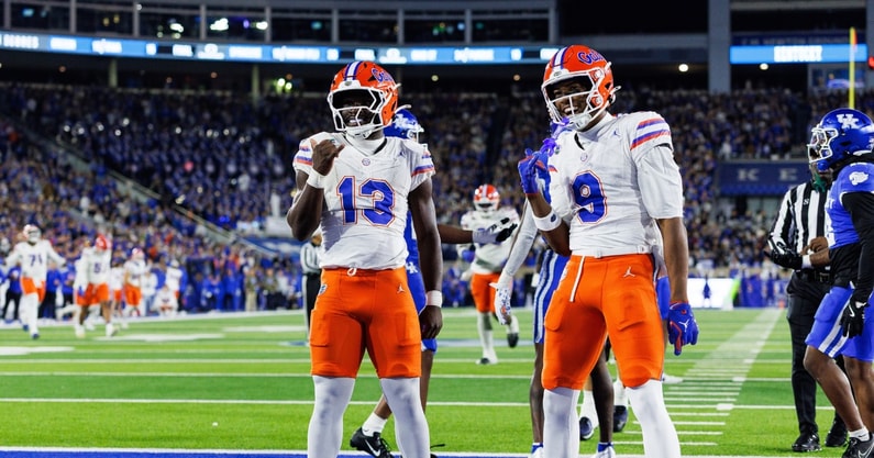 Nov 8, 2025; Lexington, Kentucky, USA; Florida Gators running back Jadan Baugh (13) celebrates with wide receiver J. Michael Sturdivant (9) after scoring a touchdown during the first quarter against the Kentucky Wildcats at Kroger Field. Mandatory Credit: Jordan Prather-Imagn Images