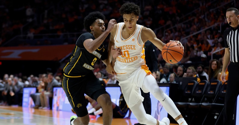 Nov 8, 2025; Knoxville, Tennessee, USA;  Tennessee Volunteers forward Nate Ament (10) moves the ball against Northern Kentucky Norse guard Dan Gherezgher (0) at Thompson-Boling Arena at Food City Center. Mandatory Credit: Randy Sartin-Imagn Images
