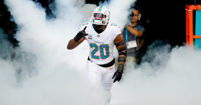 Nov 9, 2025; Miami Gardens, Florida, USA; Miami Dolphins linebacker Jordyn Brooks (20) runs on the field before a game against the Buffalo Bills at Hard Rock Stadium.