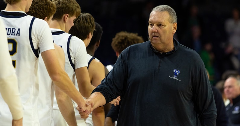 Nov 11, 2025; South Bend, Indiana, USA; Eastern Illinois Panthers head coach Marty Simmons shakes hands with Notre Dame Fighting Irish players after the second half at Purcell Pavilion at the Joyce Center. Mandatory Credit: Michael Caterina-Imagn Images