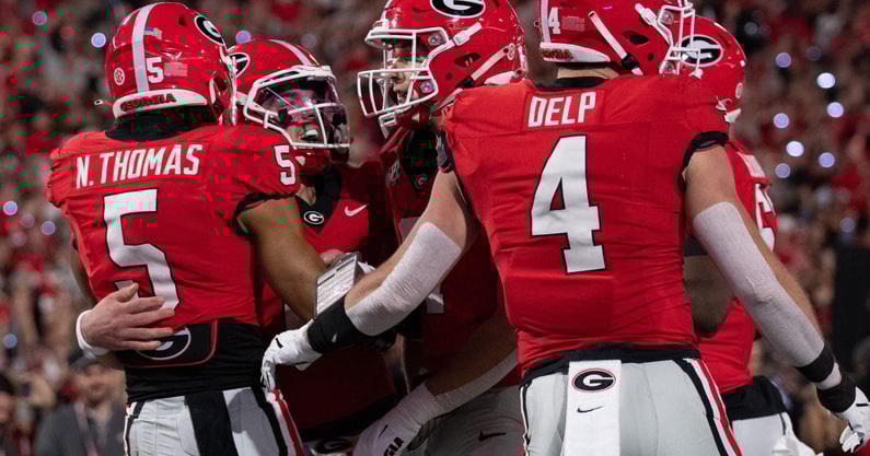 Georgia players celebrate their big win over Texas.