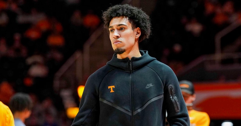 Angelina Alcantar/News Sentinel / USA TODAY NETWORK via Imagn Images | Tennessee guard Bishop Boswell (3) watches warm-ups during a NCAA basketball game between Tennessee Volunteers and North Florida Ospreys at Thompson-Boling Arena at Food City Center in Knoxville, Tenn. on Nov. 12, 2025.