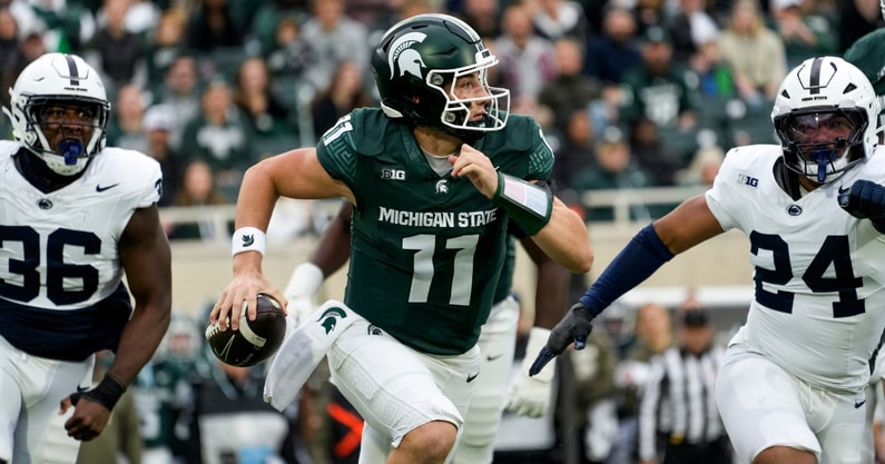 Michigan State Spartans quarterback Alessio Milivojevic (11) runs out of the pocket as Penn State Nittany Lions linebacker Amare Campbell (24) and defensive end Zuriah Fisher (36) chase. - Brendan Mullin, USA TODAY Sports