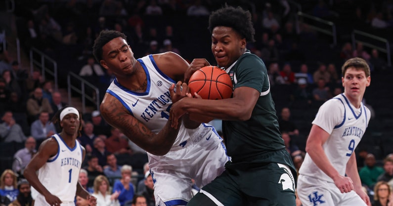 Kentucky Wildcats forward Brandon Garrison (10) and Michigan State Spartans forward Cameron Ward (3) battle for a rebound during the first half at Madison Square Garden. - Vincent Carchietta, USA TODAY Sports