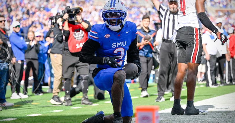 Nov 22, 2025; Dallas, Texas, USA; SMU Mustangs wide receiver Jordan Hudson (2) celebrates after he scores a touchdown against the Louisville Cardinals during the first half at Gerald J. Ford Stadium. Mandatory Credit: Jerome Miron-Imagn Images