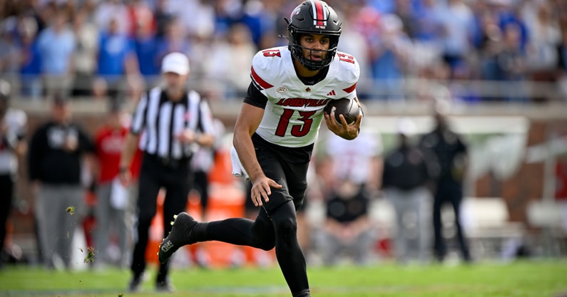 Nov 22, 2025; Dallas, Texas, USA; Louisville Cardinals quarterback Deuce Adams (13) runs with the ball against the SMU Mustangs during the first half at Gerald J. Ford Stadium. Mandatory Credit: Jerome Miron-Imagn Images