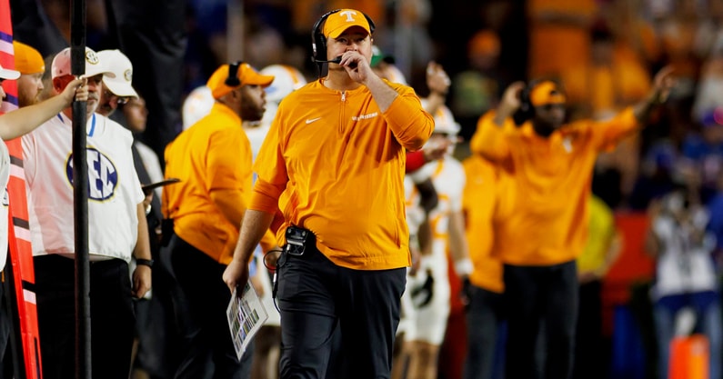 Nov 22, 2025; Gainesville, Florida, USA; Tennessee Volunteers head coach Josh Heupel walks the sideline against the Florida Gators during the first half at Ben Hill Griffin Stadium. Mandatory Credit: Matt Pendleton-Imagn Images
