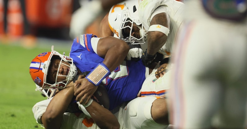 Florida quarterback DJ Lagway (2) gets sacked by Tennessee during the first half of an NCAA football game against Tennessee at Steve Spurrier Field at Ben Hill Griffin Stadium in Gainesville, FL on Saturday, November 22, 2025. [Alan Youngblood/Gainesville Sun]
