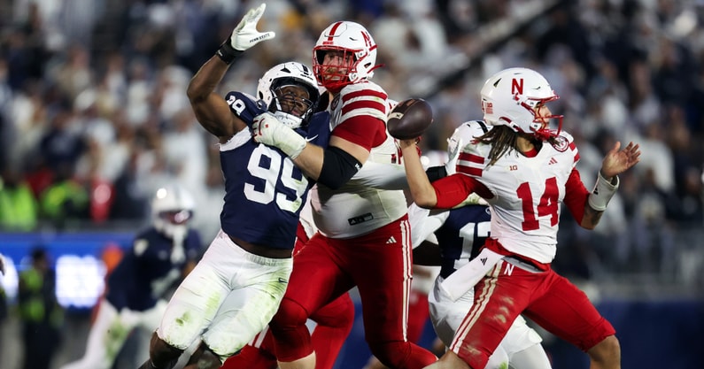 Nebraska football QB TJ Lateef (14) and OL Turner Corcoran against Penn State