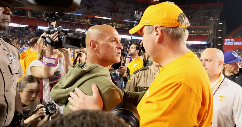Florida Interim Head Coach Billy Gonzales meets Tennessee head coach Josh Heupel midfield after an NCAA football game against Tennessee at Steve Spurrier Field at Ben Hill Griffin Stadium in Gainesville, FL on Saturday, November 22, 2025. Florida lost to Tennessee 31-11[Alan Youngblood/Gainesville Sun]