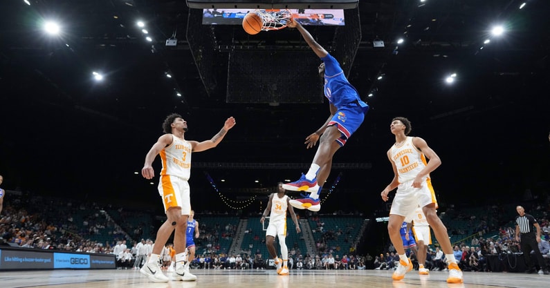 Nov 26, 2025; Las Vegas, NV, USA; Kansas Jayhawks forward Flory Bidunga (40) dunks the ball in the second half against the Tennessee Volunteers in the 2025 Players Era Festival third place game at MGM Grand Garden Arena. Mandatory Credit: Kirby Lee-Imagn Images