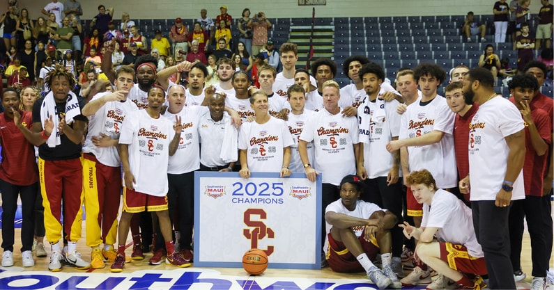 USC Trojans take a team photo after they defeated the Arizona State Sun Devils in the championship match at Lahaina Civic Center