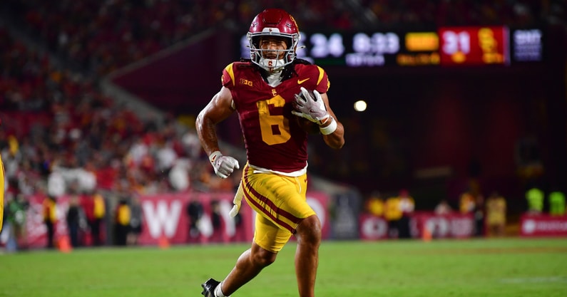 USC Trojans wide receiver Makai Lemon (6) runs for a touchdown against the Michigan State Spartans during the second half at the Los Angeles Memorial Coliseum