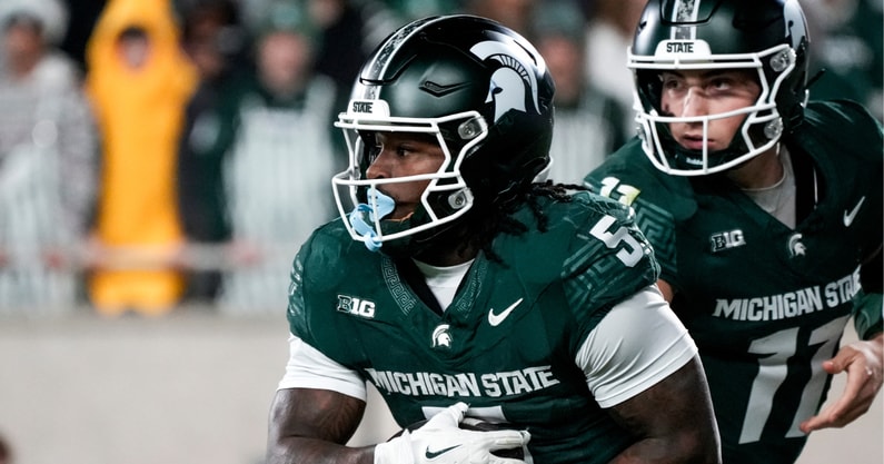 Michigan State quarterback Alessio Milivojevic (11) hands the ball off to Michigan State running back Makhi Frazier (5) against Penn State in the third quarter at Spartan Stadium. - Brendan Mullin, USA TODAY Sports
