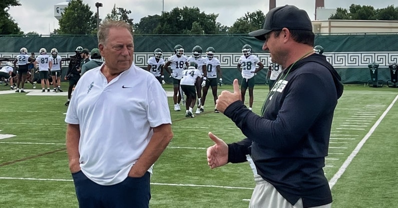Michigan State basketball coach Tom Izzo with former Spartan football coach Jonathan Smith (photo by Jim Comparoni for SpartanMag.com).