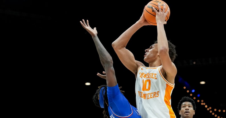 Nov 26, 2025; Las Vegas, NV, USA; Tennessee Volunteers forward Nate Ament (10) shoots over Kansas Jayhawks guard Jamari McDowell (11) in the first half in the 2025 Players Era Festival third place game at MGM Grand Garden Arena. Mandatory Credit: Kirby Lee-Imagn Images