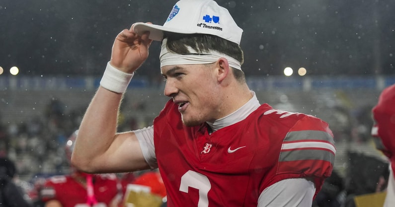 Baylor's Briggs Cherry (3) puts his championship hat on his head during the Division II-AAA championship game at Finley Stadium in Chattanooga, Tenn., on Dec. 4, 2025.