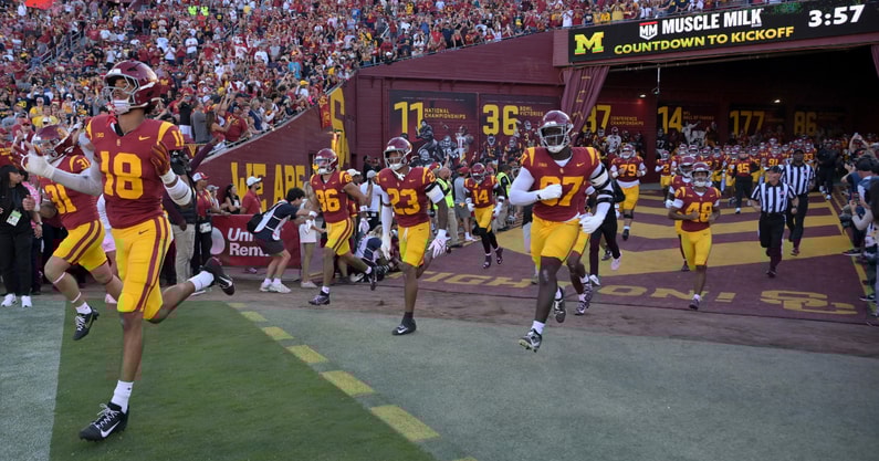 USC Trojans run out of the tunnel and on to the field for the game against the Michigan Wolverines at United Airlines Field at the Los Angeles Memorial Coliseum
