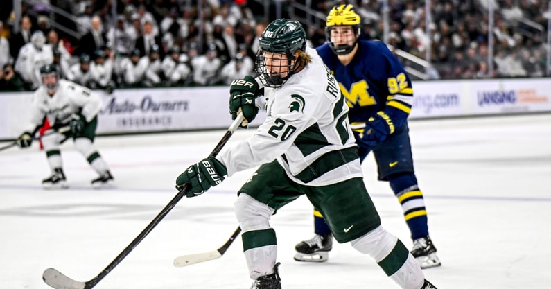 Michigan State's Daniel Russell shoots the puck against Michigan during the third period on Friday, Dec. 5, 2025, at Munn Ice Arena in East Lansing. - Nick King, USA TODAY Sports