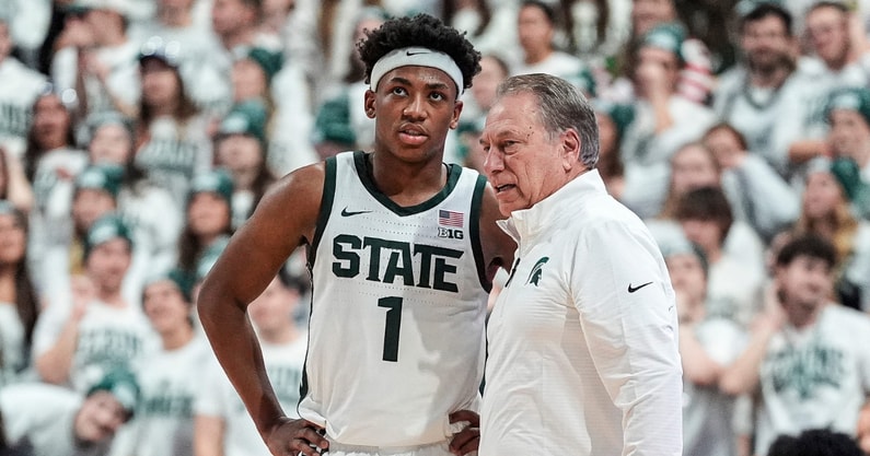Michigan State guard Jeremy Fears Jr. talks to head coach Tom Izzo during the first half against Duke at Breslin Center in East Lansing on Saturday, Dec. 6, 2025. - Junfu Han, USA TODAY Sports