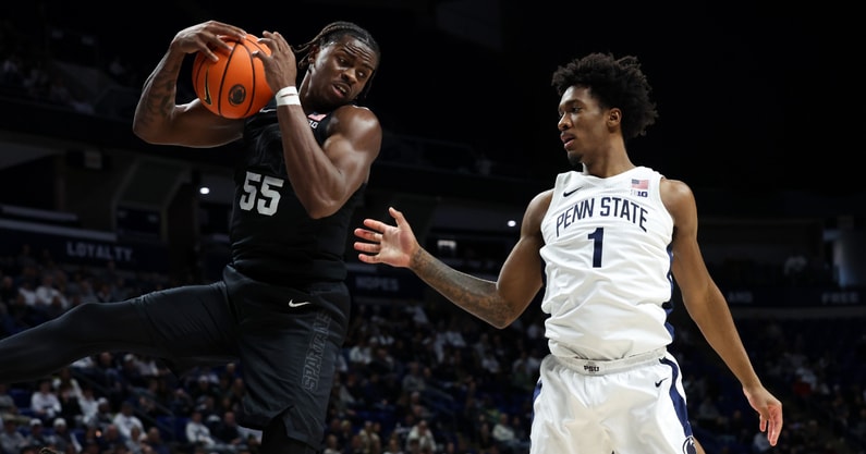 Michigan State Spartans forward Coen Carr (55) jumps for the rebound during the first half against the Penn State Nittany Lions at Bryce Jordan Center. - Matthew O'Haren, USA TODAY Sports