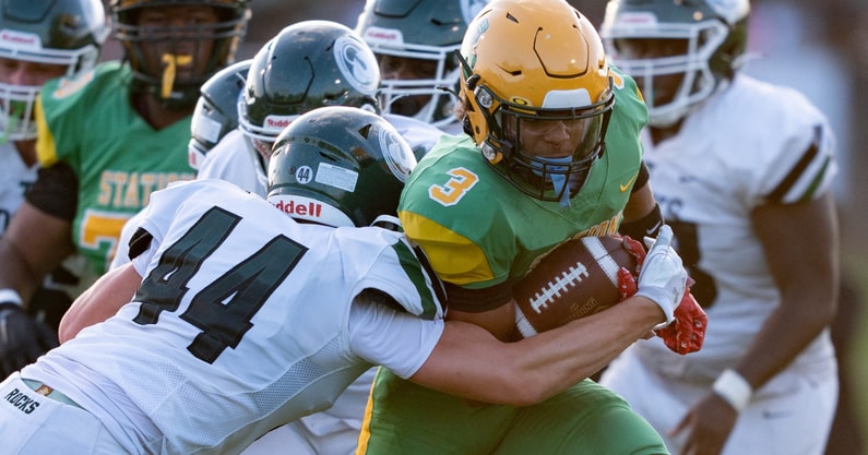 Trinity's Nick Lococo (44) tackles Bryan Station's Jordan Haskins (3) during their game on Friday, Aug. 23, 2024 at Bryan Station High School in Lexington, Ky.