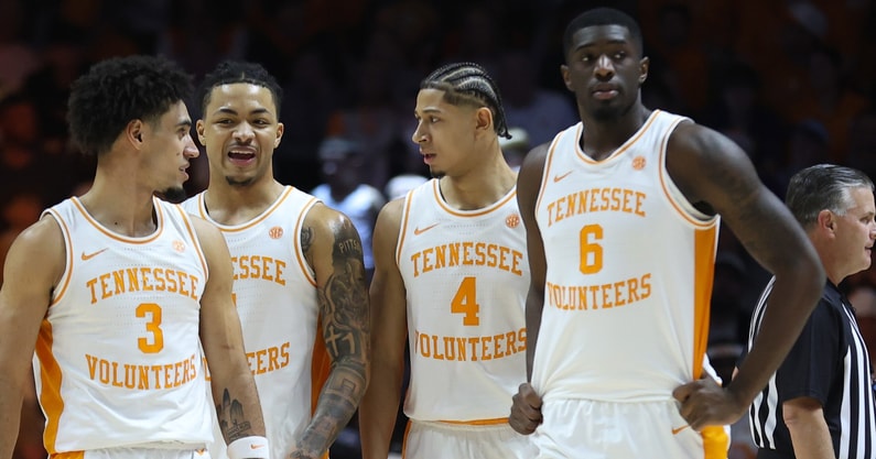 Dec 21, 2025; Knoxville, Tennessee, USA;  Tennessee Volunteers guard Bishop Boswell (3) and guard Amari Evans (1) and guard Clarence Massamba (4) and forward Dewayne Brown II (6) during the first half against the Gardner-Webb Runnin' Bulldogs at Thompson-Boling Arena at Food City Center. Mandatory Credit: Randy Sartin-Imagn Images