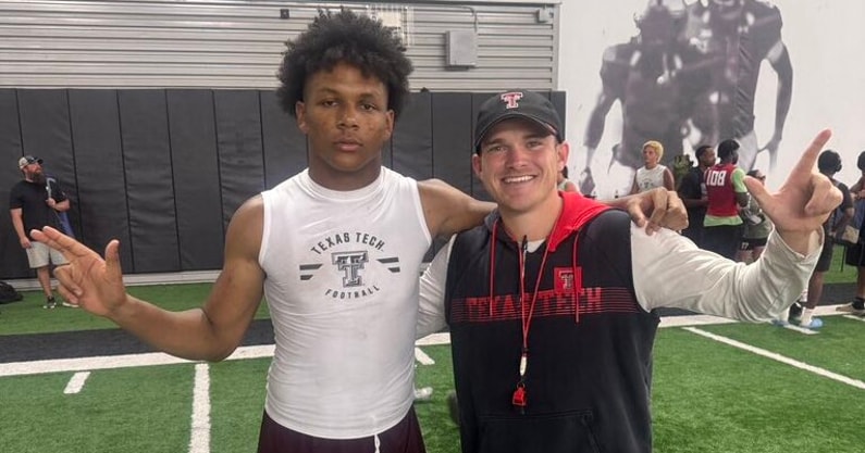 Josiah Walker with Texas Tech assistant coach Garret McGuire