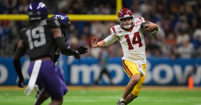 USC Trojans quarterback Jayden Maiava (14) carries the ball against the TCU Horned Frogs in the second half during the Alamo Bowl at Alamodome