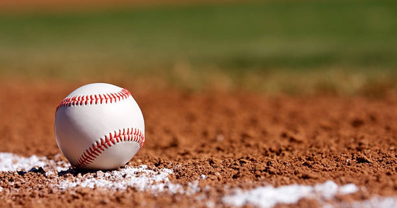 Baseball on the Chalk Line of the Infield