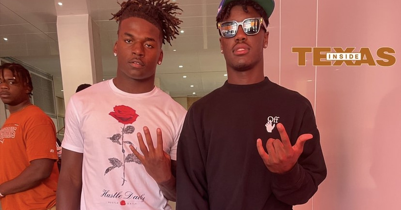 Harold Perkins, Denver Harris watching the Longhorns today.