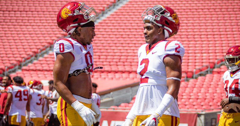 USC rush ends Korey Foreman and Romello Height talk during the Trojans' 2022 spring game at the Los Angeles Memorial Coliseum