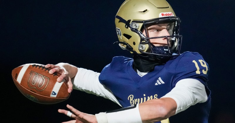 =Tri-West Bruins quarterback Jack Sorgi (19) looks to pass Friday, Oct. 31, 2025, during a game between the Tri-West Bruins and the Cascade Cadets at Tri-West High School in Lizton, Ind.