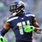 Seattle Seahawks former Ole Miss star DK Metcalf carted off due to injury vs Chargers ruled out Week 7
