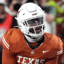 Colin Simmons carted to locker room in Texas vs. Florida