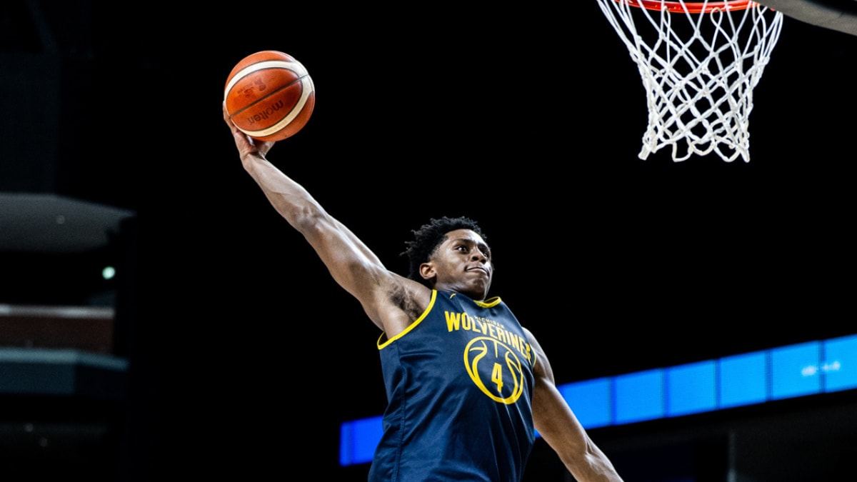 Michigan Wolverines basketball guard Brandon McCoy Jr. dunks against the Lithuania Men's National Team. (Photo by Michigan basketball)