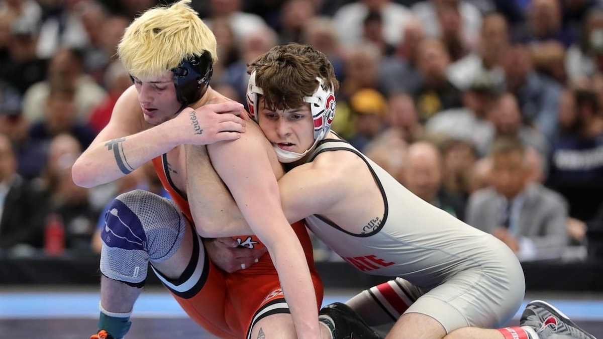 2026-03-22T152302Z_843476538_MT1USATODAY28563971_RTRMADP_3_OKLAHOMA-STATE-S-JAX-FORREST-LEFT-WRESTLES-OHIO-STATE-S (1)