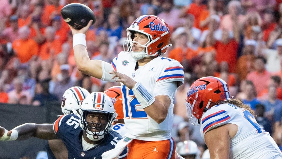 Florida Gators quarterback Aaron Philo (12) throws the ball as Auburn Tigers take on Florida Gators at Jordan-Hare Stadium in
