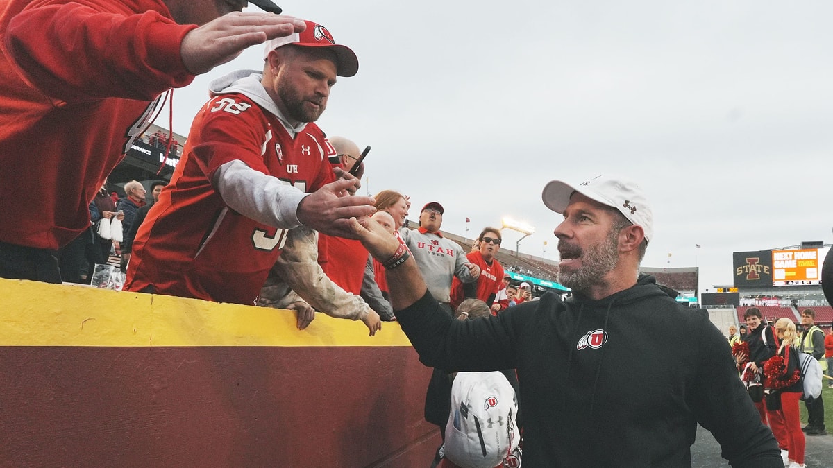 Utah head coach Morgan Scalley celebrates with fans after Utahs 31-17 victory over Iowa State on Sept. 26, 2026, at Jack Trice