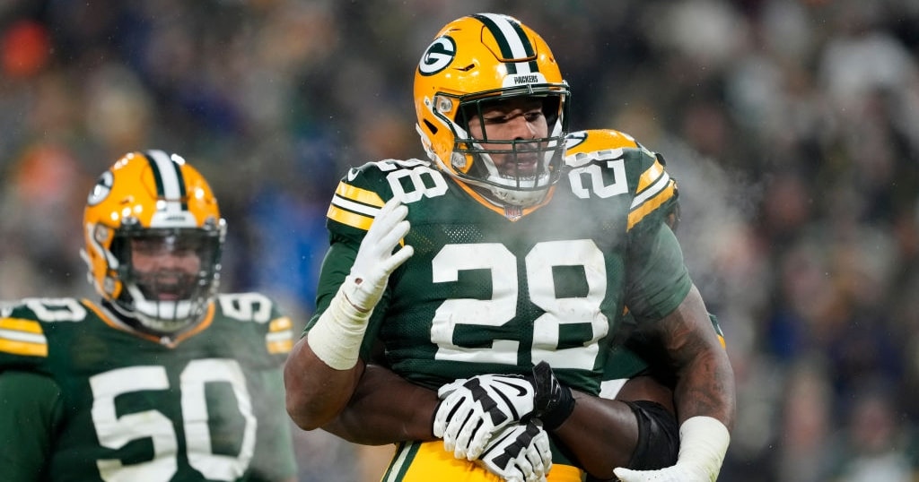 LOOK: A.J. Dillon, Pat O'Donnell attend historic soccer match at Lambeau  Field - On3