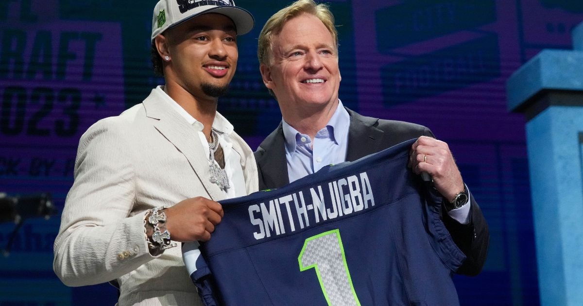 After being drafted No. 20 overall by Seattle, Jaxon Smith-Njigba says 'it  took a village' to get to the NFL