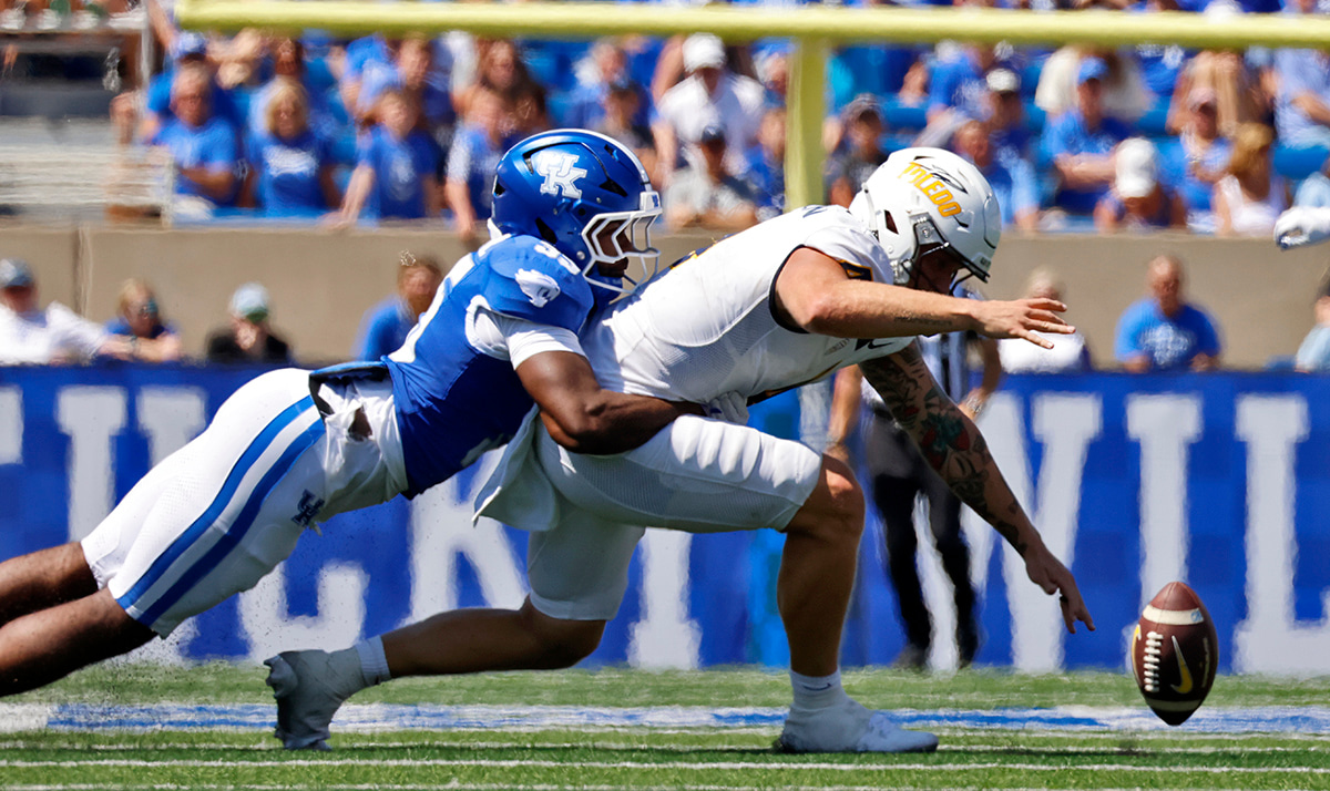 Kentucky linebacker Steven Soles Jr. sacked Toledo quarterback Tucker Gleason and forced a fumble during the Wildcats' 24-16 win over the Rockets on Saturday at Kroger Field.