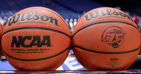 Man dressed in LeBron James Miami Heat uniform tries to check into Lindenwood-IUPUI game