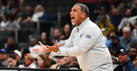 Georgetown suspends Ed Cooley for throwing water bottle into stands that hit child
