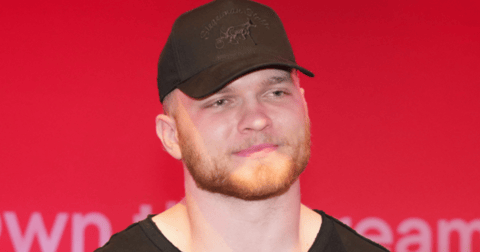 Aidan Hutchinson joins Morgan Wallen's walkout at Big House concert, receives signed guitar