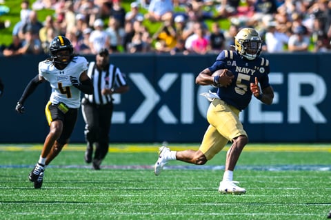 Woodson leads Navy past Towson in season opener