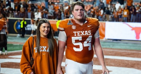 Texas OL Cole Hutson suited up for pregame warmups vs. Tennessee