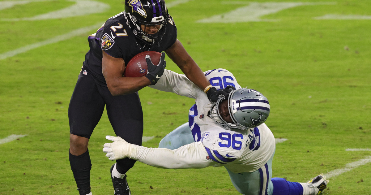 Dallas Cowboys defensive tackle Neville Gallimore (96) walks on the  sideline during the first half of an NFL preseason football game against  the Jacksonville Jaguars, Saturday, Aug. 12, 2023, in Arlington, Texas. (