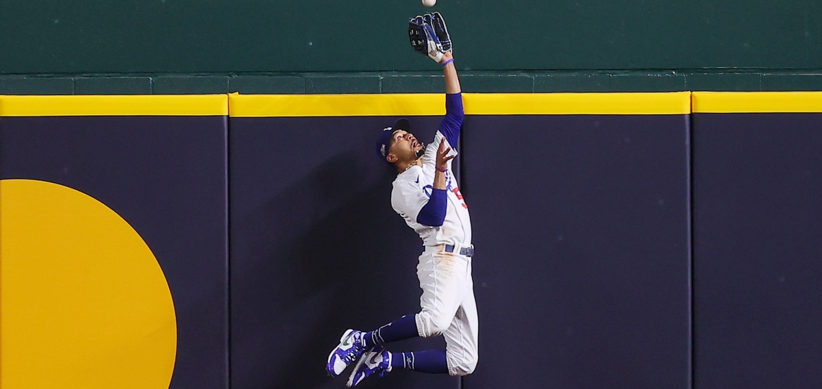 Watch Mookie Betts make shoestring grab, throw out runner at home