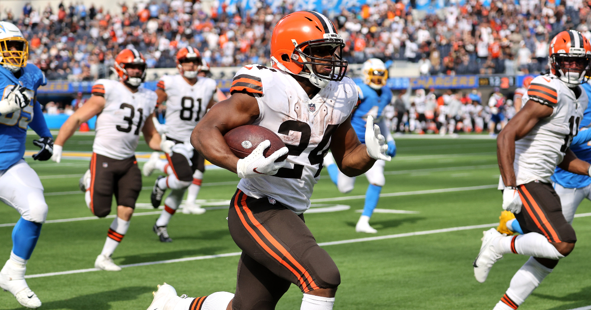 Bulldogs in the NFL - Image 34: Cleveland Browns running back Nick Chubb  (left) and his cousin Denver Broncos outside linebacker Bradley Chubb  (right) exchange jerseys following the game at Broncos Stadium